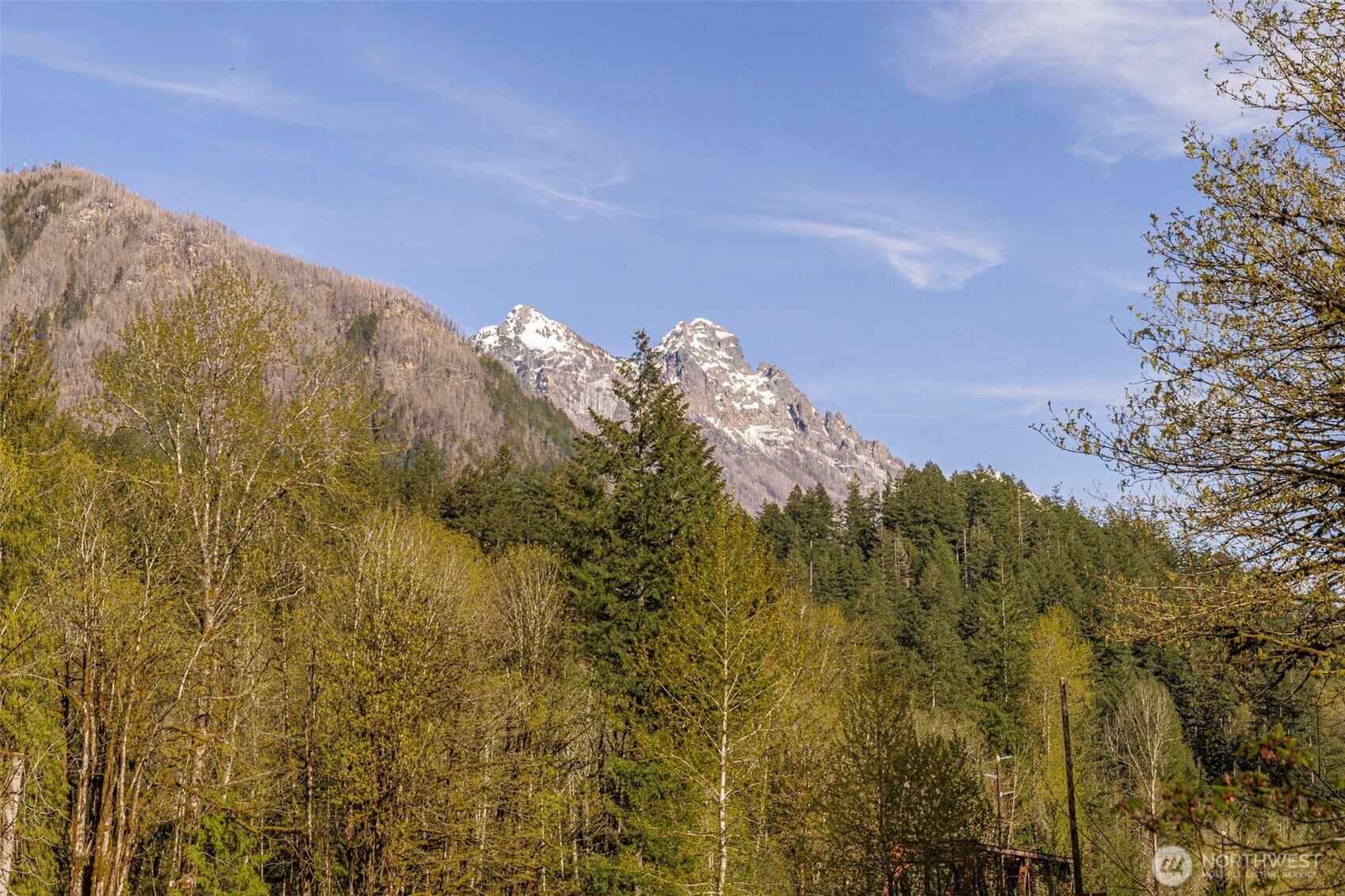 0 State Route 2 Gold Bar, WA 98251 - Photo 9 of 25 a view of a large building with mountains in the background