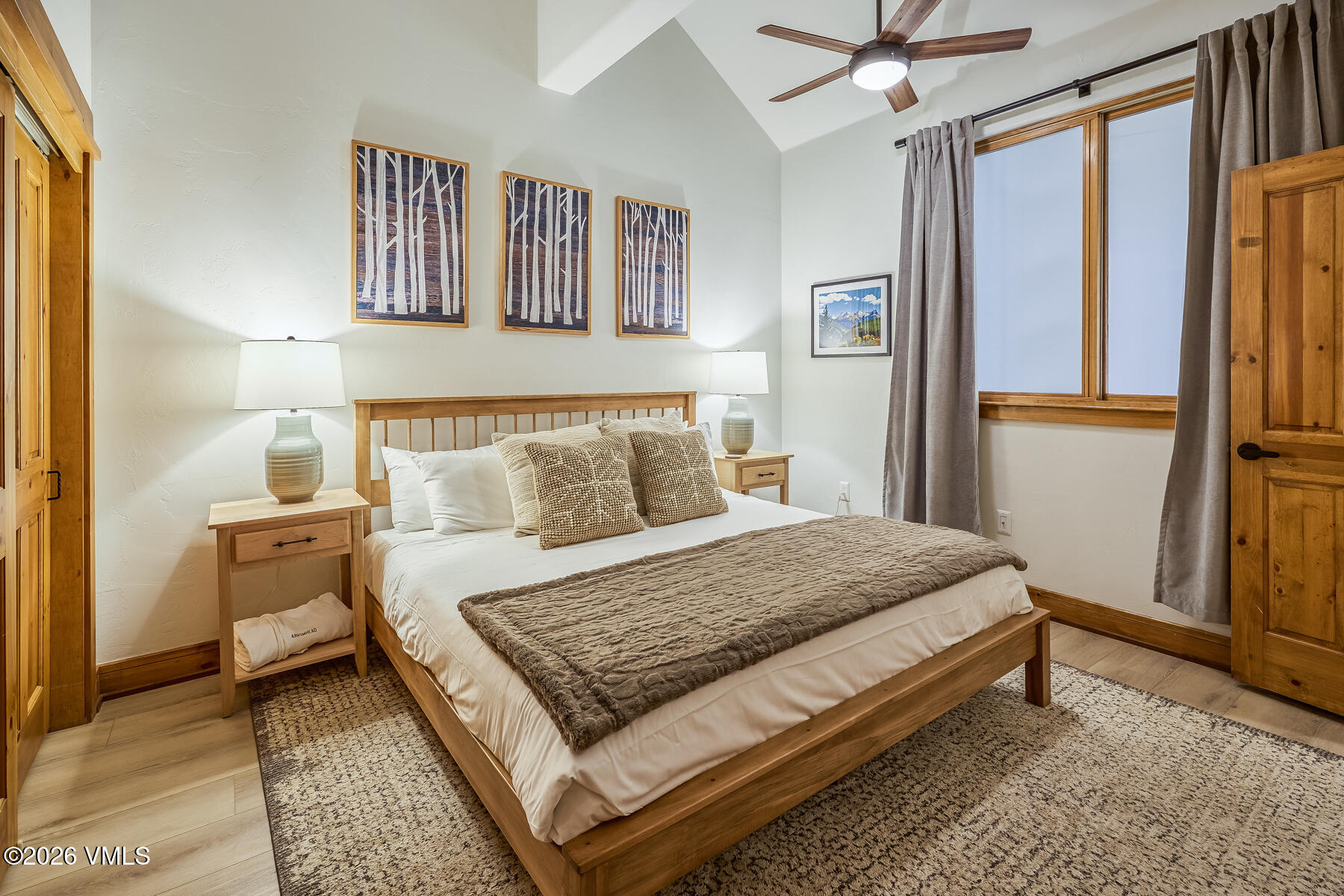 30 Cresta Road, Unit 306 Edwards, CO 81632 - Photo 19 of 26 a bedroom with a bed rug and wall painting
