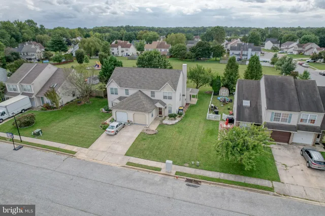 a aerial view of a house with garden