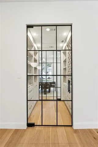 a view of staircase with wooden floor