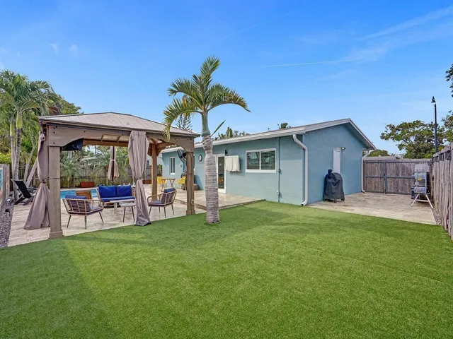 a view of a lounge chairs in patio