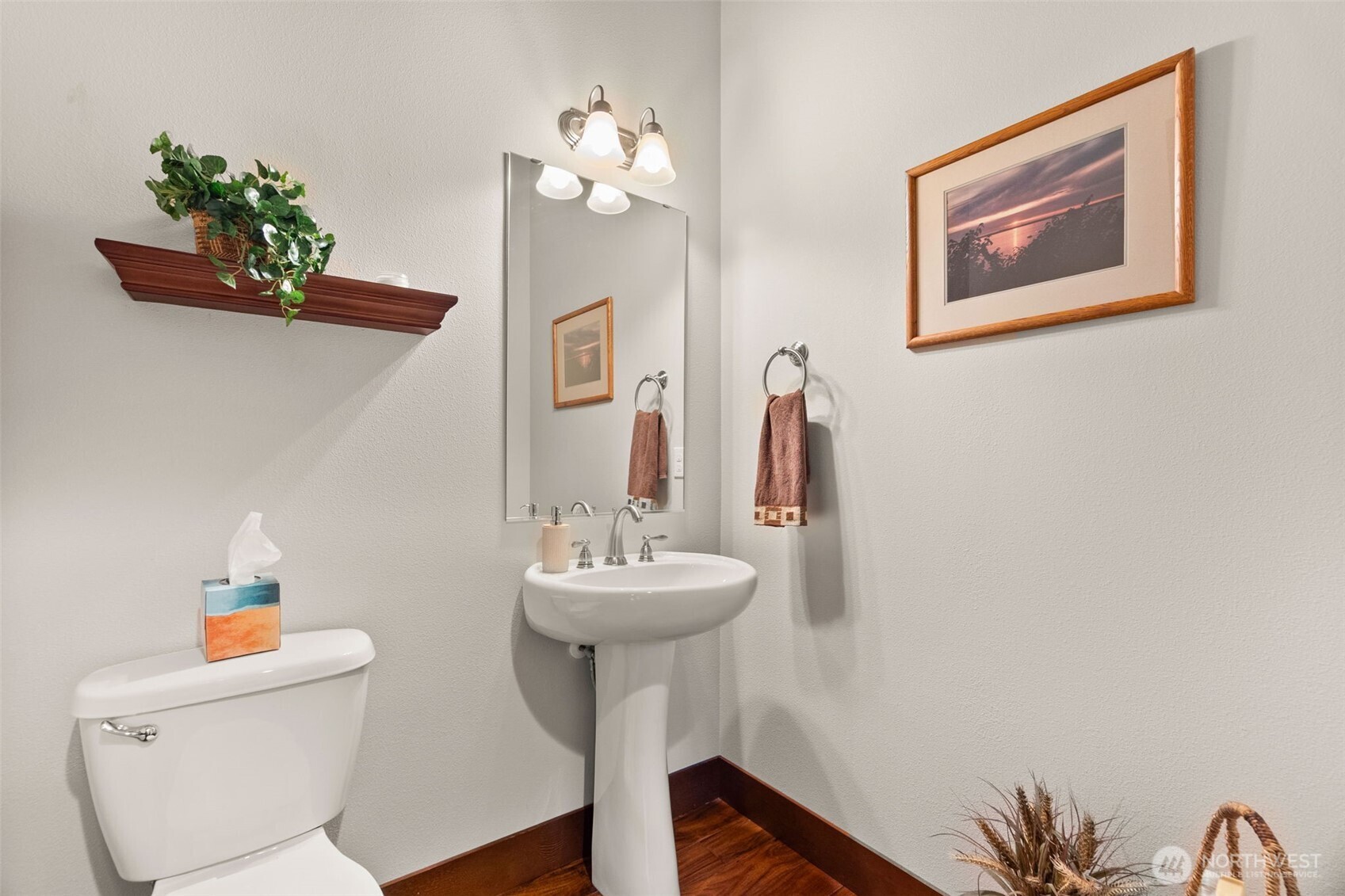 8235 Orcas Loop Northeast Olympia, WA 98516 - Photo 24 of 39 a bathroom with a toilet sink and mirror