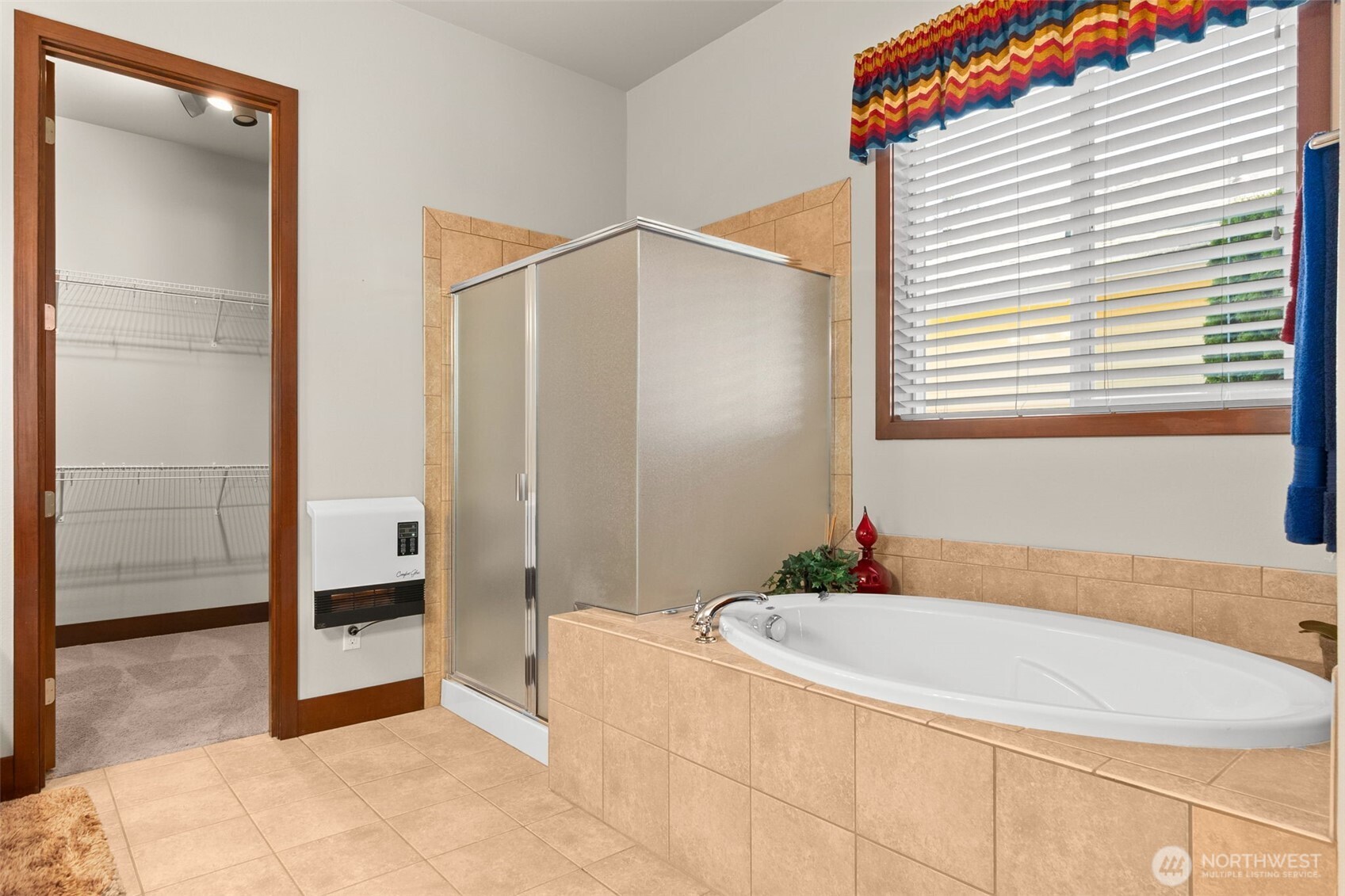 8235 Orcas Loop Northeast Olympia, WA 98516 - Photo 28 of 39 a bathroom with a granite countertop sink and a mirror