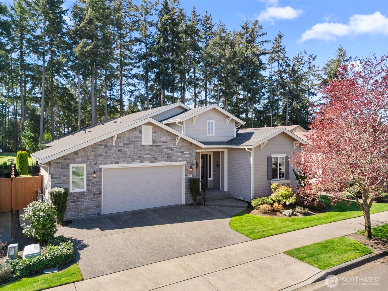 8235 Orcas Loop Northeast Olympia, WA 98516 - Photo 3 of 39 a front view of house with yard and green space