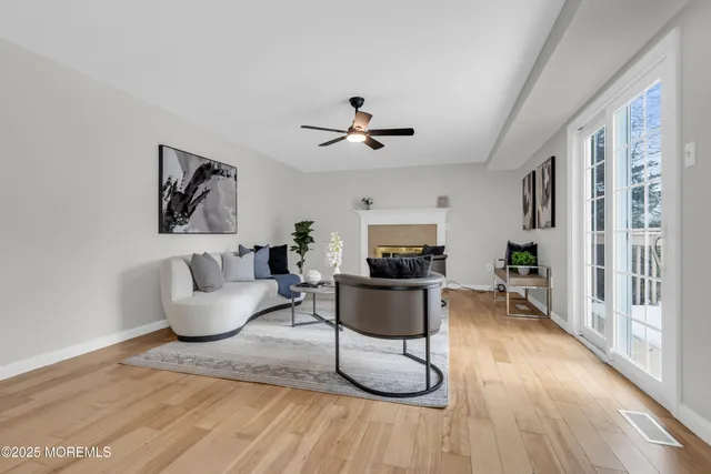 a kitchen with stainless steel appliances a refrigerator sink and microwave