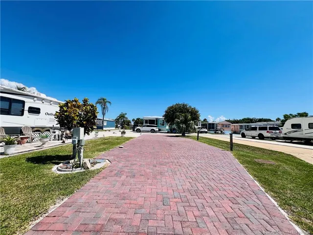 a swimming pool with barbeque oven