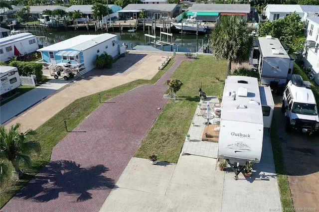 an aerial view of a house with outdoor space