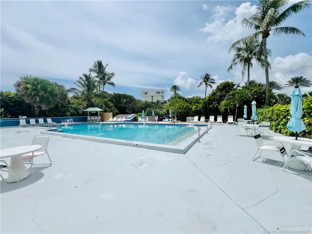 a view of a house with a swimming pool