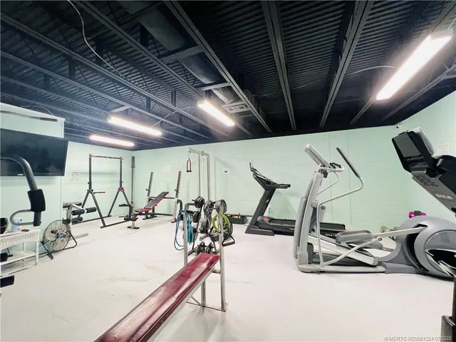 a view of a room with gym equipment