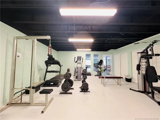 a view of an chairs and table in the patio