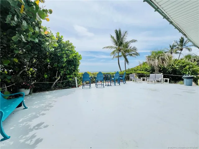 a view of a house with wooden stairs