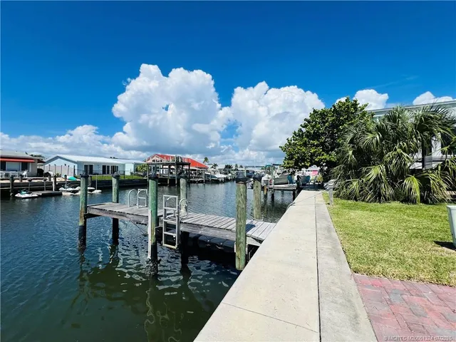 a view of a lake with a sitting space