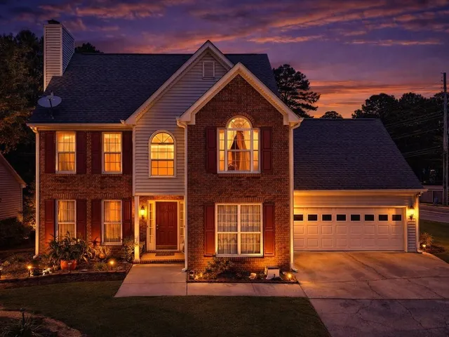 a front view of building with yard