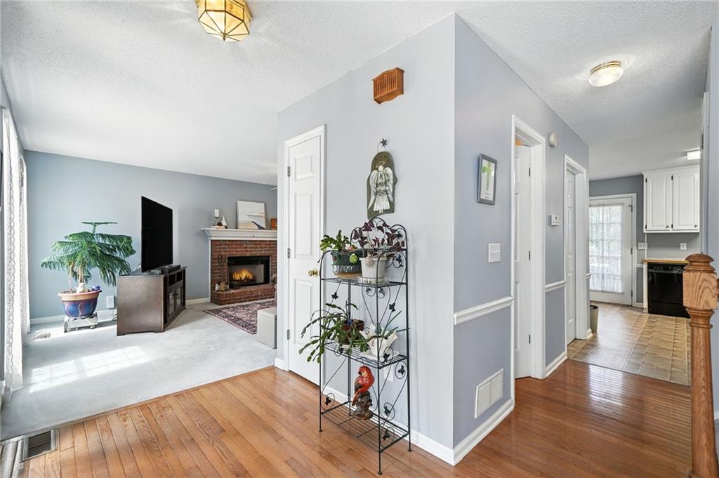 2000 Spicers Lane Woodstock, GA 30189 - Photo 13 of 33 a view of a living room and kitchen