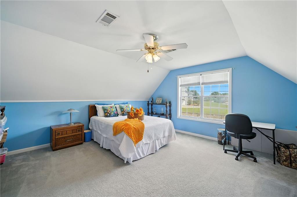 2000 Spicers Lane Woodstock, GA 30189 - Photo 21 of 33 a bed room with a bed and a chair