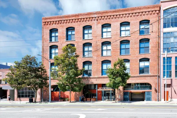 a view of a building with a street