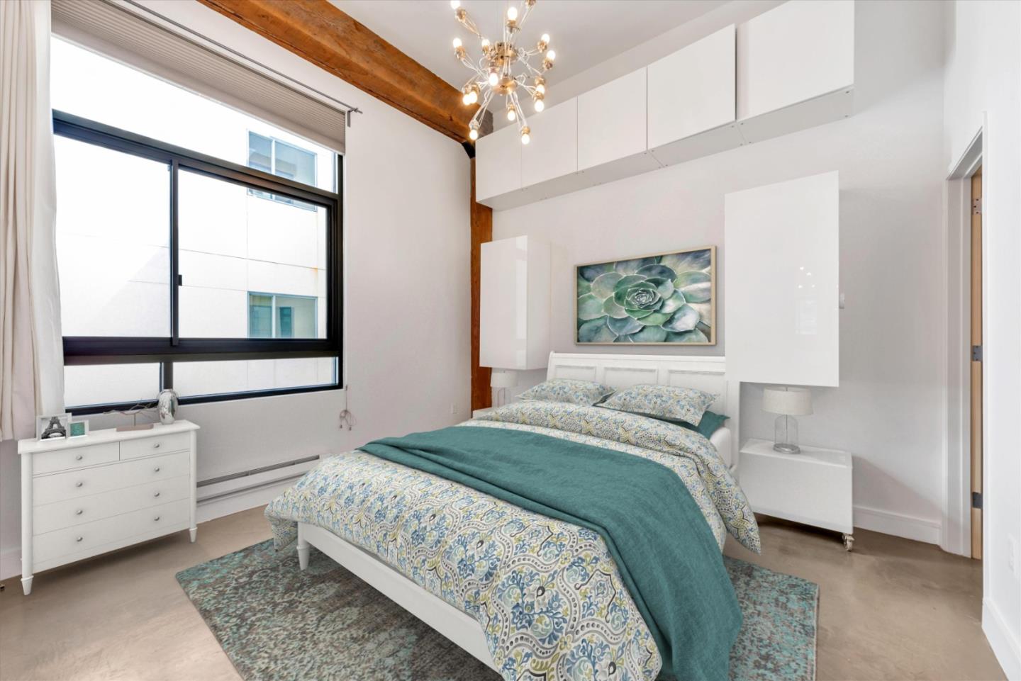 310 Townsend Street, Unit 305 San Francisco, CA 94107 - Photo 17 of 30 a bedroom with a large bed and a window