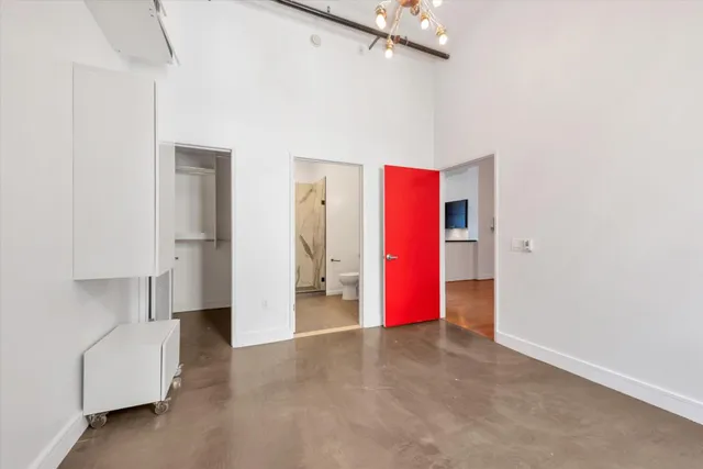 a view of empty room with windows