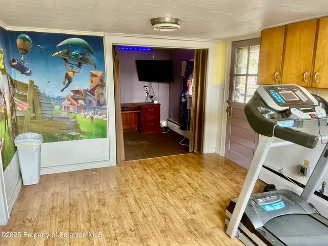 a view of a room with gym equipment