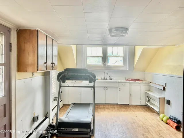 a room with bed and a table