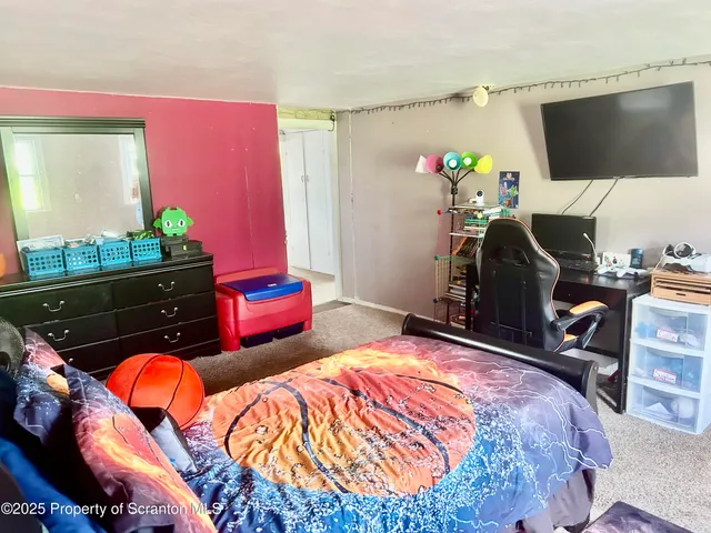 a workspace with furniture and a window