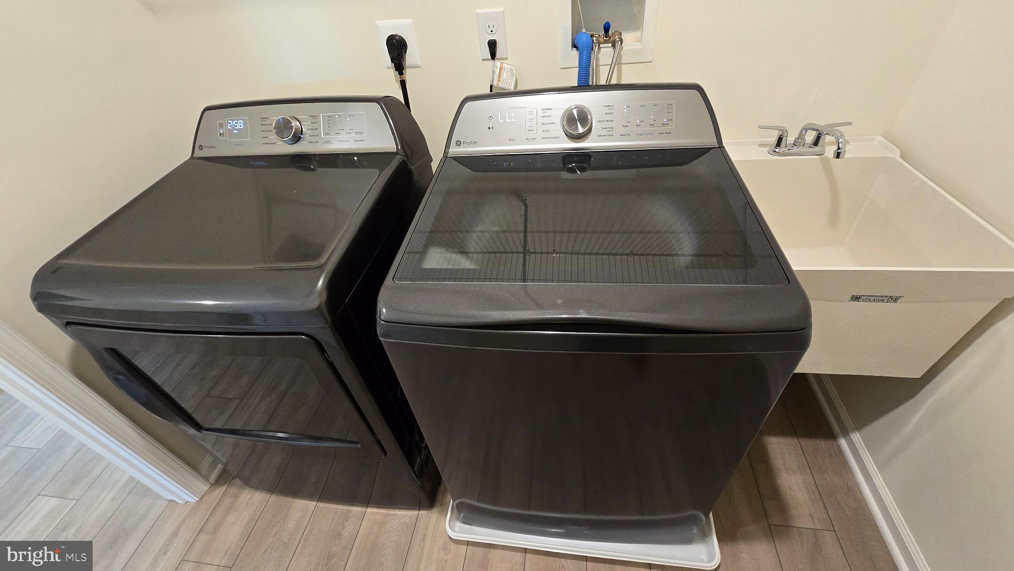 48 Parry Way Warminster, PA 18974 - Photo 16 of 23 Modern laundry setup with sleek appliances.