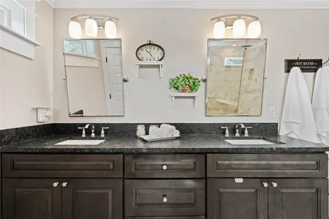 a white bath tub sitting in a bathroom