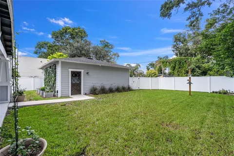 a front view of a house with yard