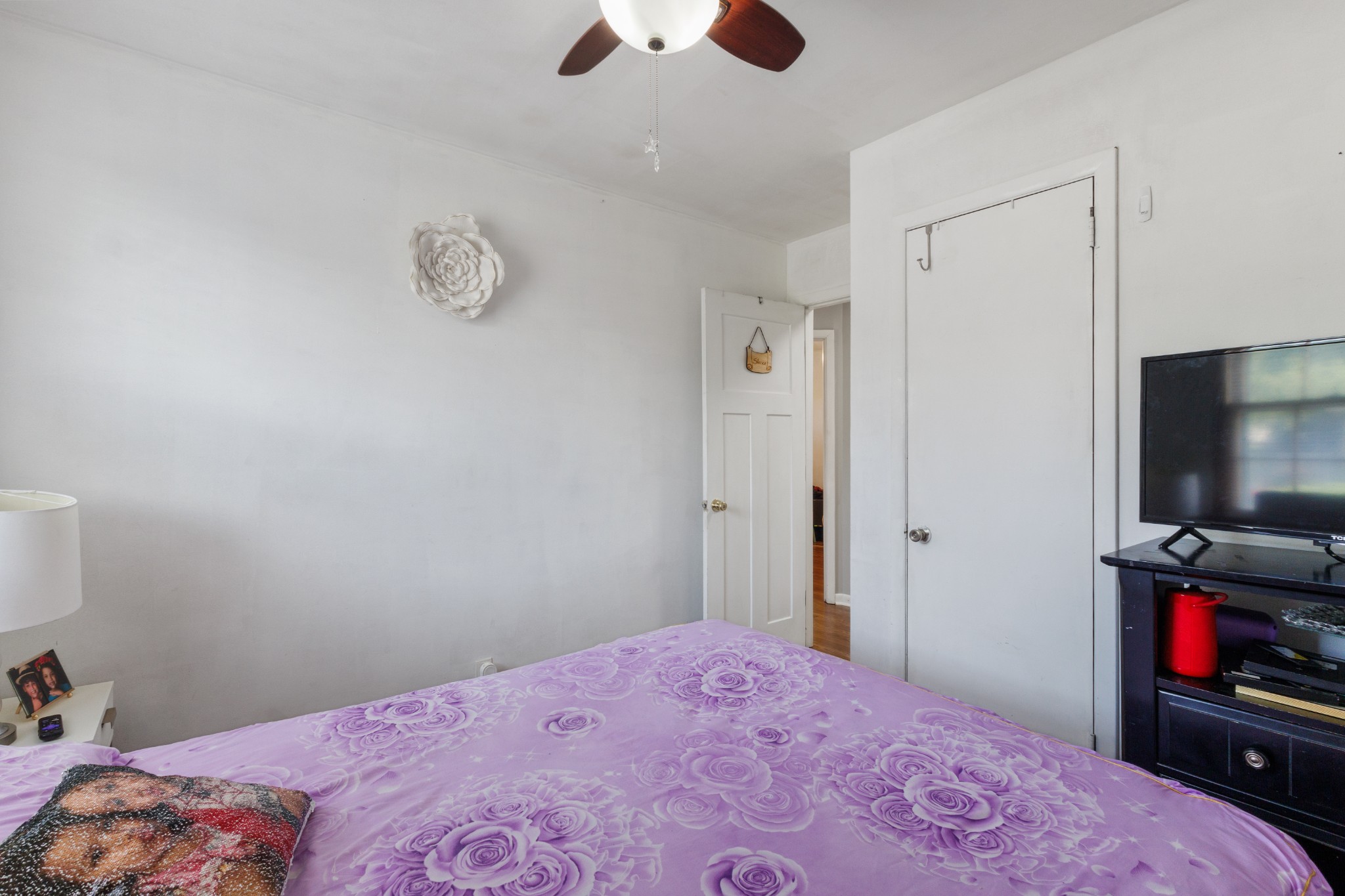 528 Singer Drive Madison, TN 37115 - Photo 11 of 24 a bedroom with a bed and a flat screen tv