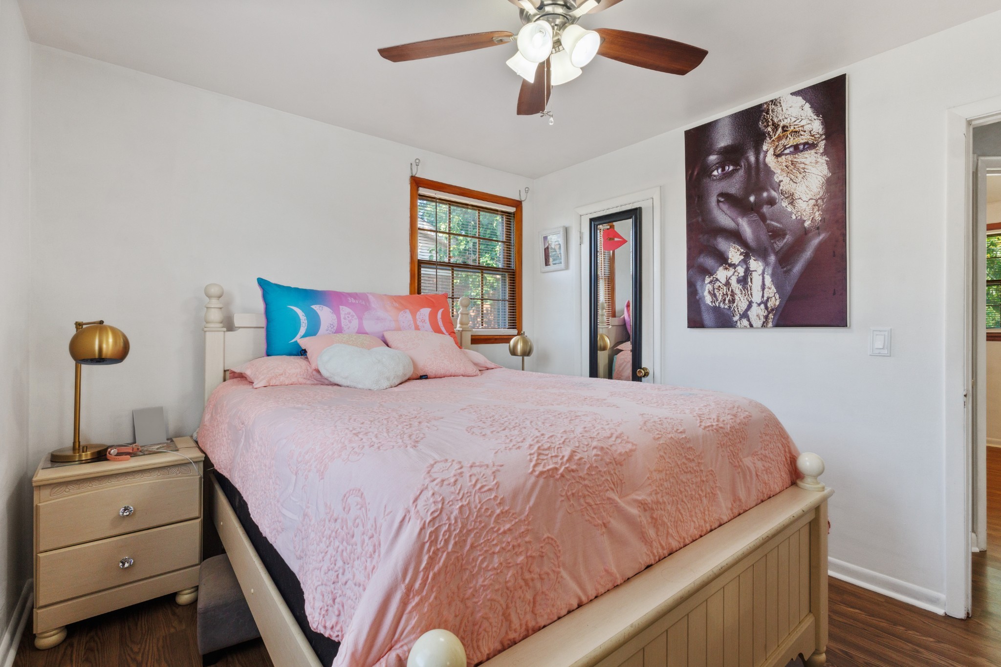 528 Singer Drive Madison, TN 37115 - Photo 13 of 24 a bedroom with a bed and a chandelier