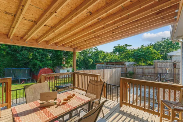a view of a patio on wooden deck
