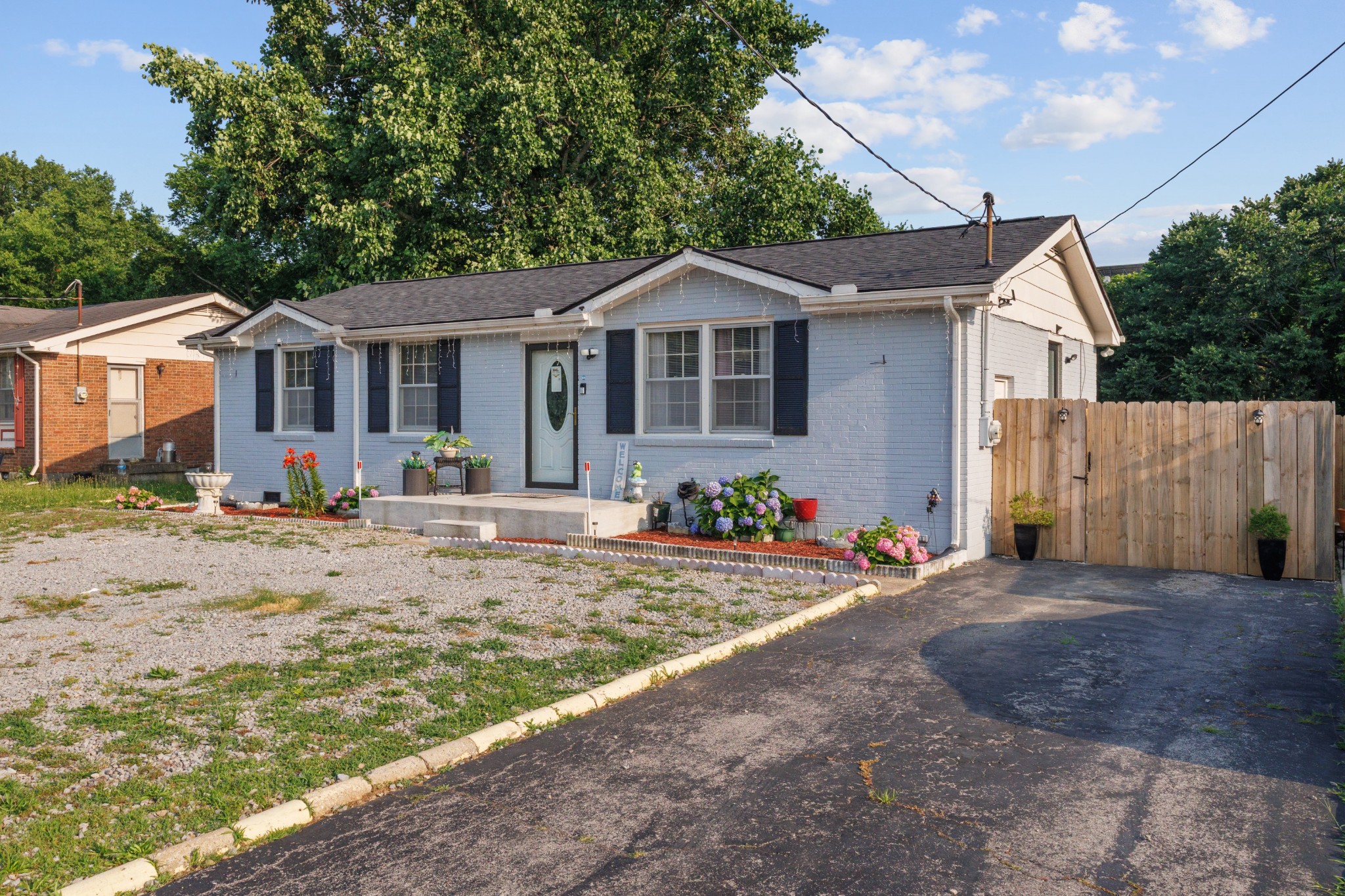 528 Singer Drive Madison, TN 37115 - Photo 19 of 24 a front view of a house with a yard