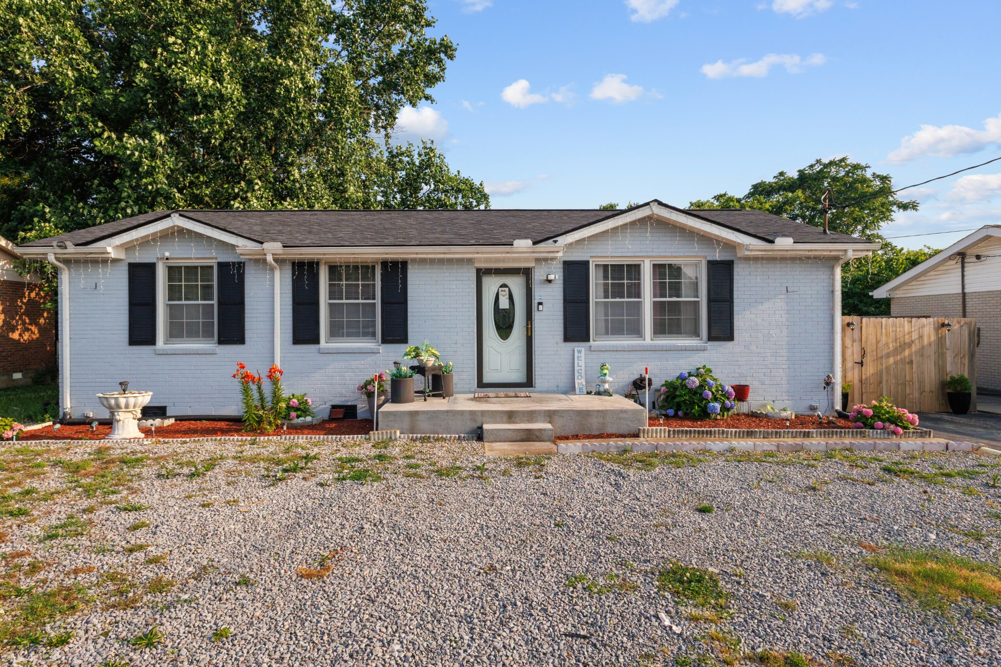 528 Singer Drive Madison, TN 37115 - Photo 21 of 24 a front view of a house with patio