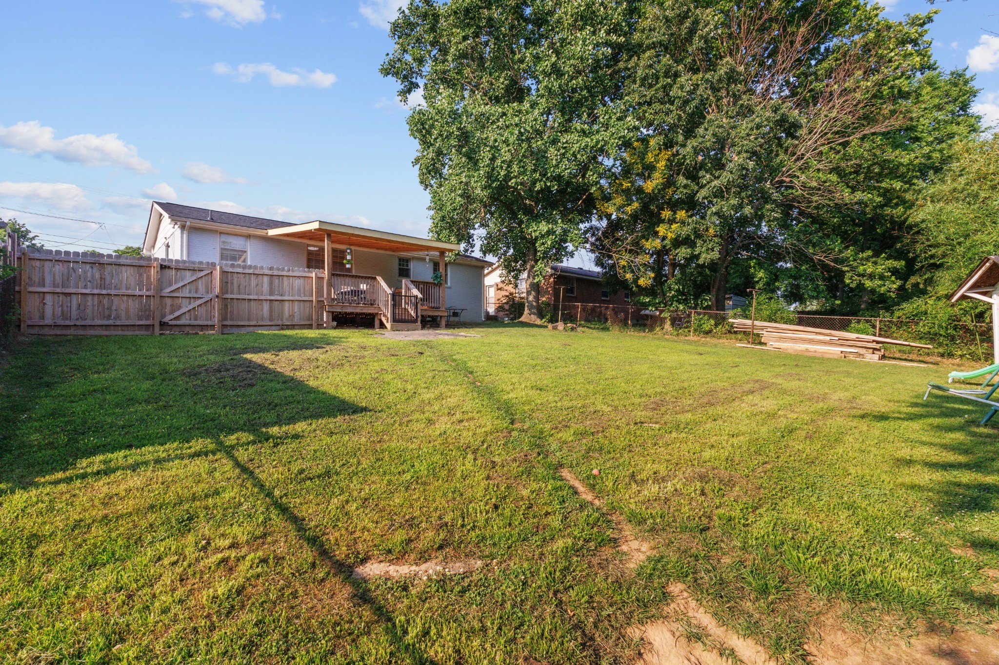 528 Singer Drive Madison, TN 37115 - Photo 24 of 24 a view of a house with a big yard and large trees
