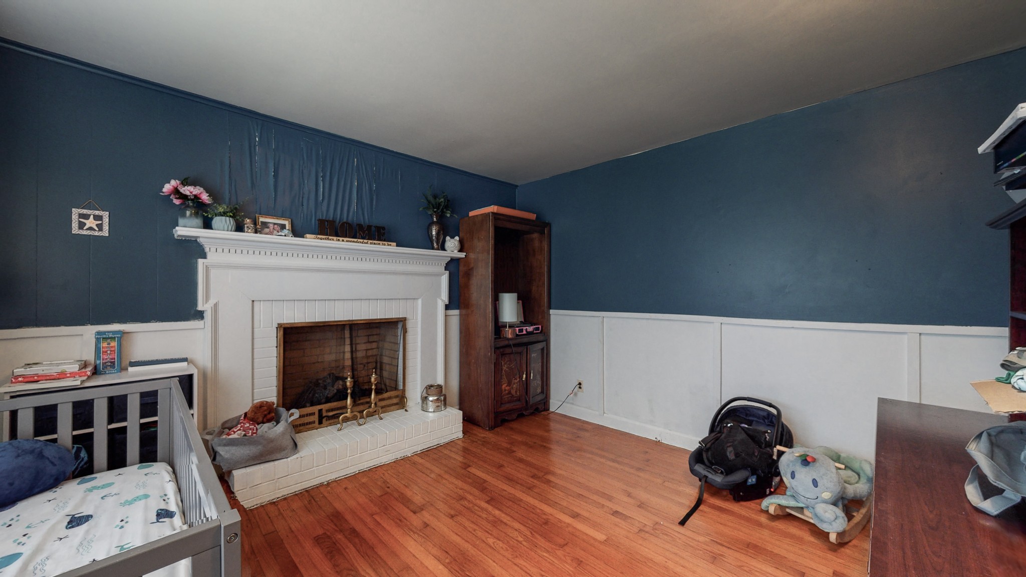 31129 Ardmore Ridge Road Ardmore, TN 38449 - Photo 21 of 50 a living room with furniture and a fireplace