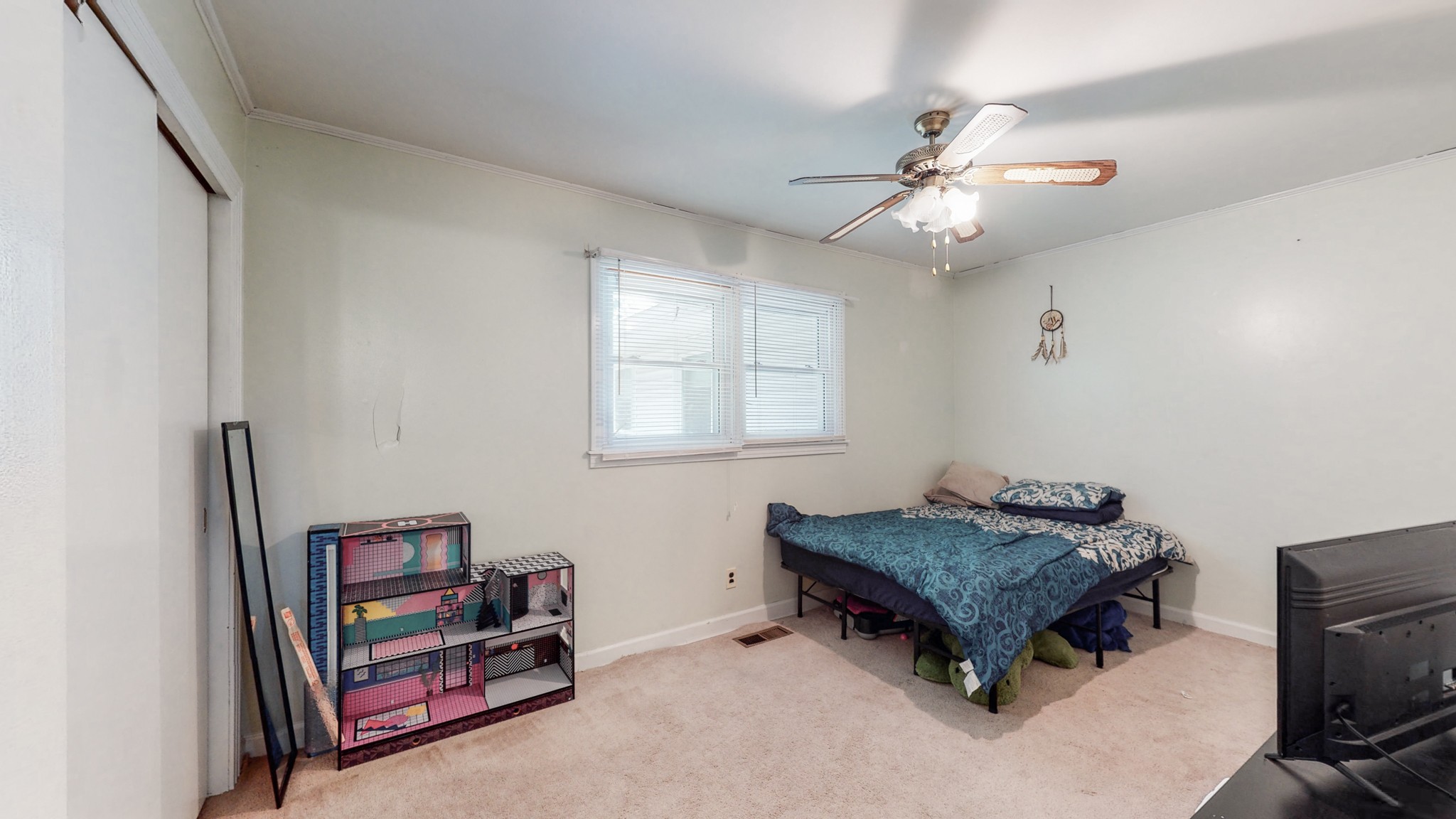 31129 Ardmore Ridge Road Ardmore, TN 38449 - Photo 29 of 50 a living room with furniture and a baby crib
