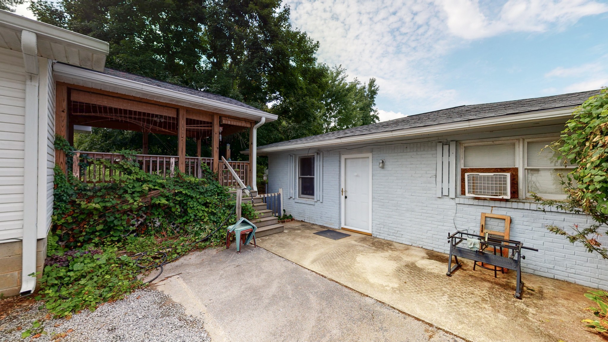 31129 Ardmore Ridge Road Ardmore, TN 38449 - Photo 39 of 50 a backyard of a house with yard and outdoor seating