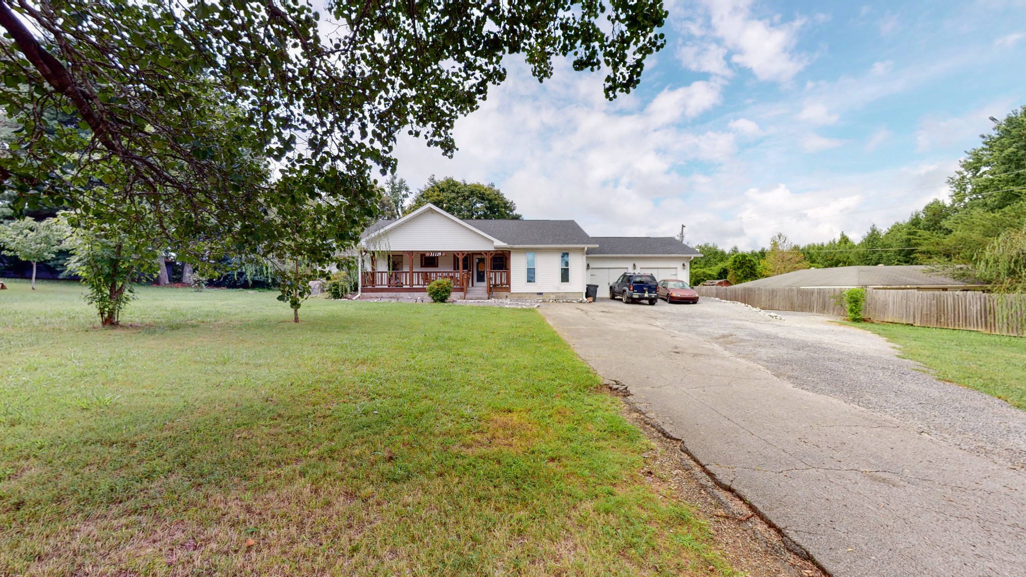 31129 Ardmore Ridge Road Ardmore, TN 38449 - Photo 4 of 50 a view of a street with a house
