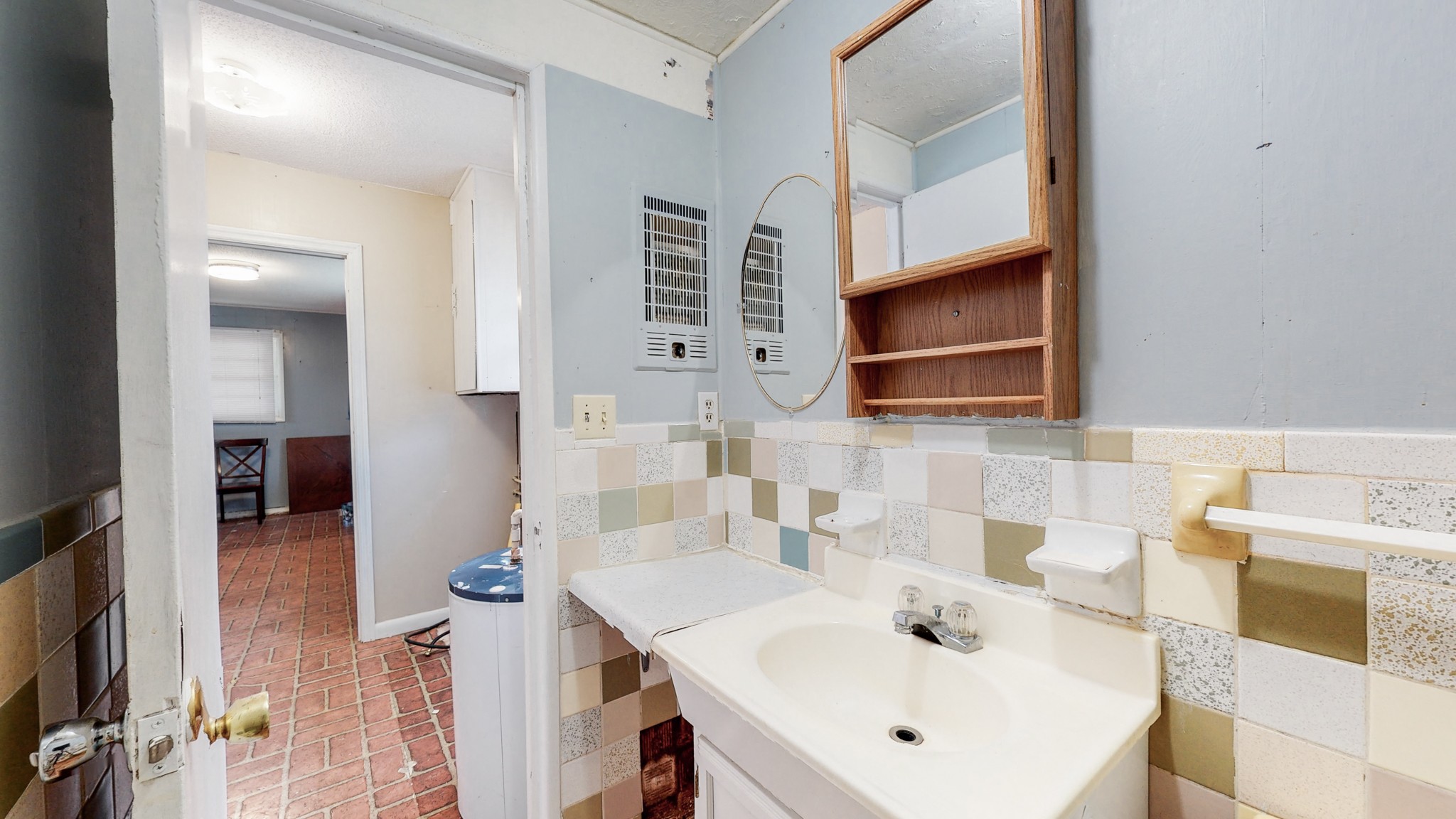 31129 Ardmore Ridge Road Ardmore, TN 38449 - Photo 42 of 50 a bathroom with a sink a toilet and a mirror
