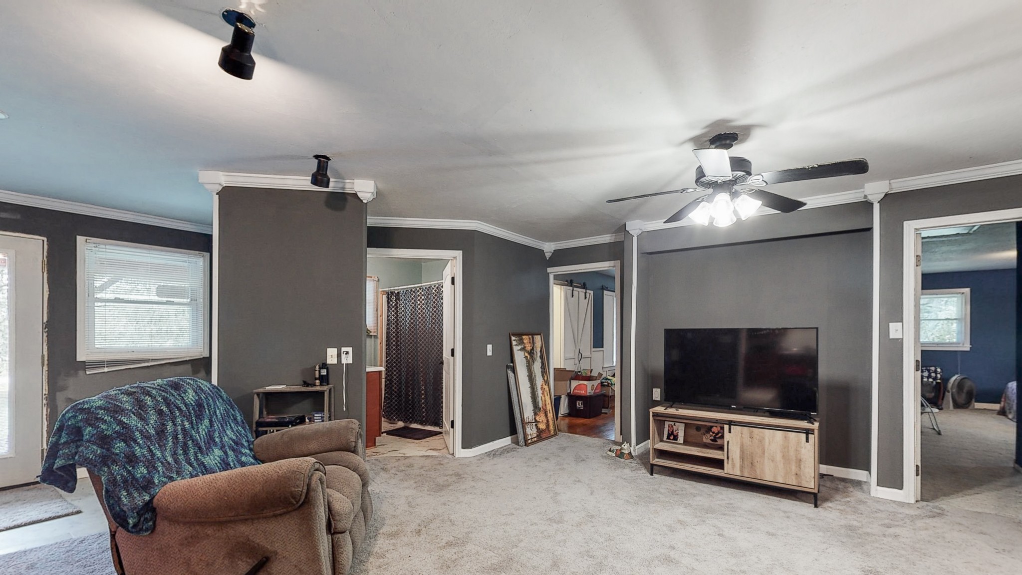 31129 Ardmore Ridge Road Ardmore, TN 38449 - Photo 8 of 50 a living room with furniture and a flat screen tv