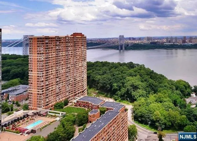 a view of a lake with a city