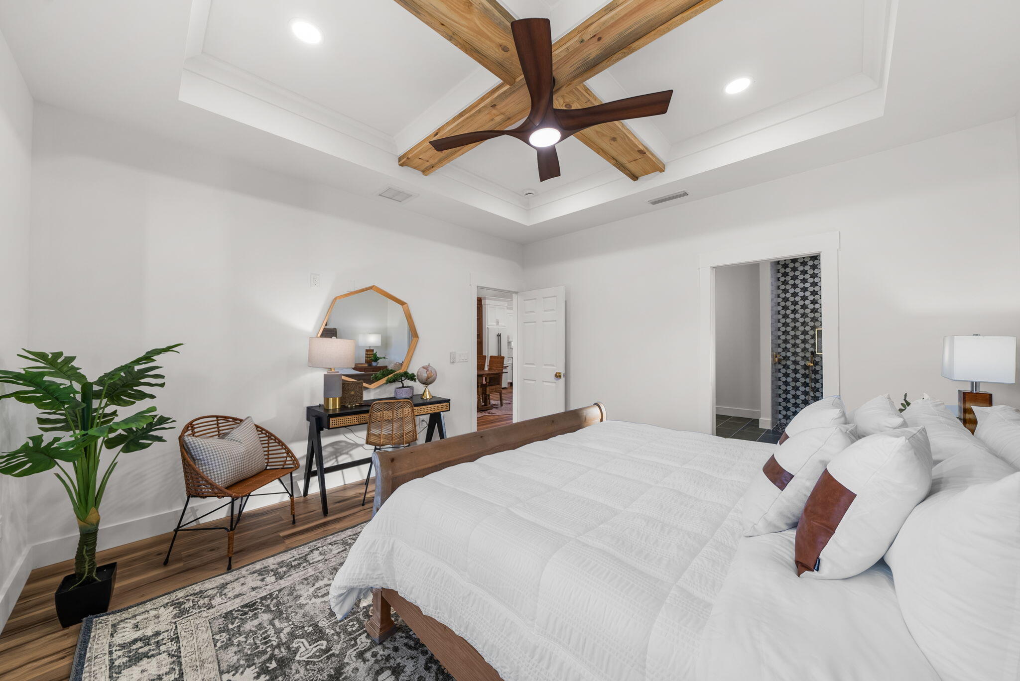 1831 McKenzie Road Southport, FL 32409 - Photo 14 of 48 a bedroom with a bed and a chandelier