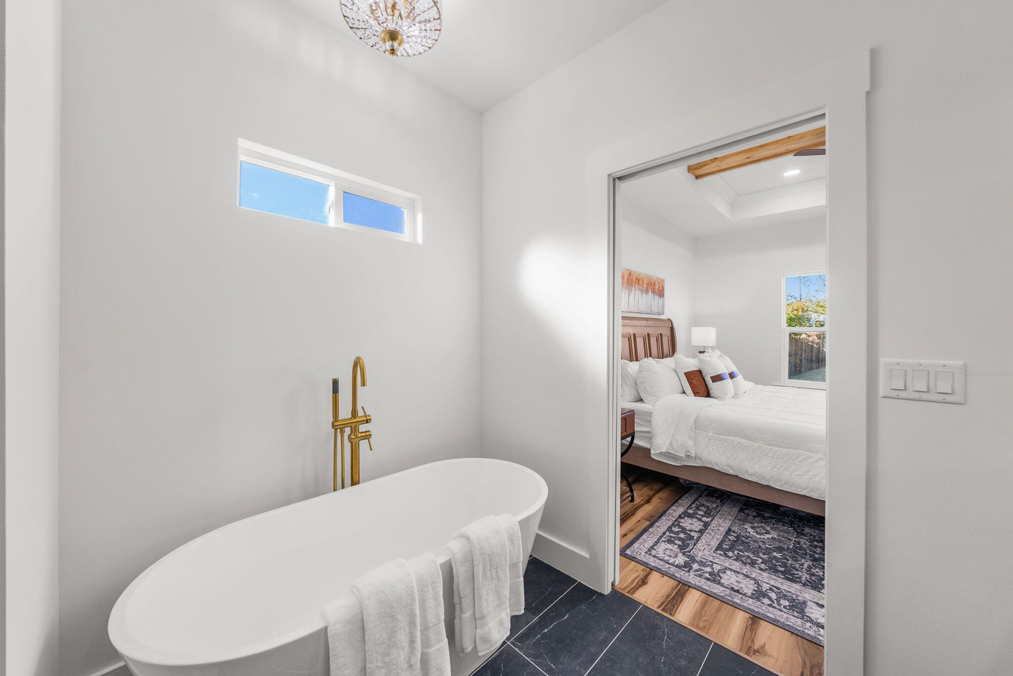 1831 McKenzie Road Southport, FL 32409 - Photo 17 of 48 a bedroom with a bed and wooden floor