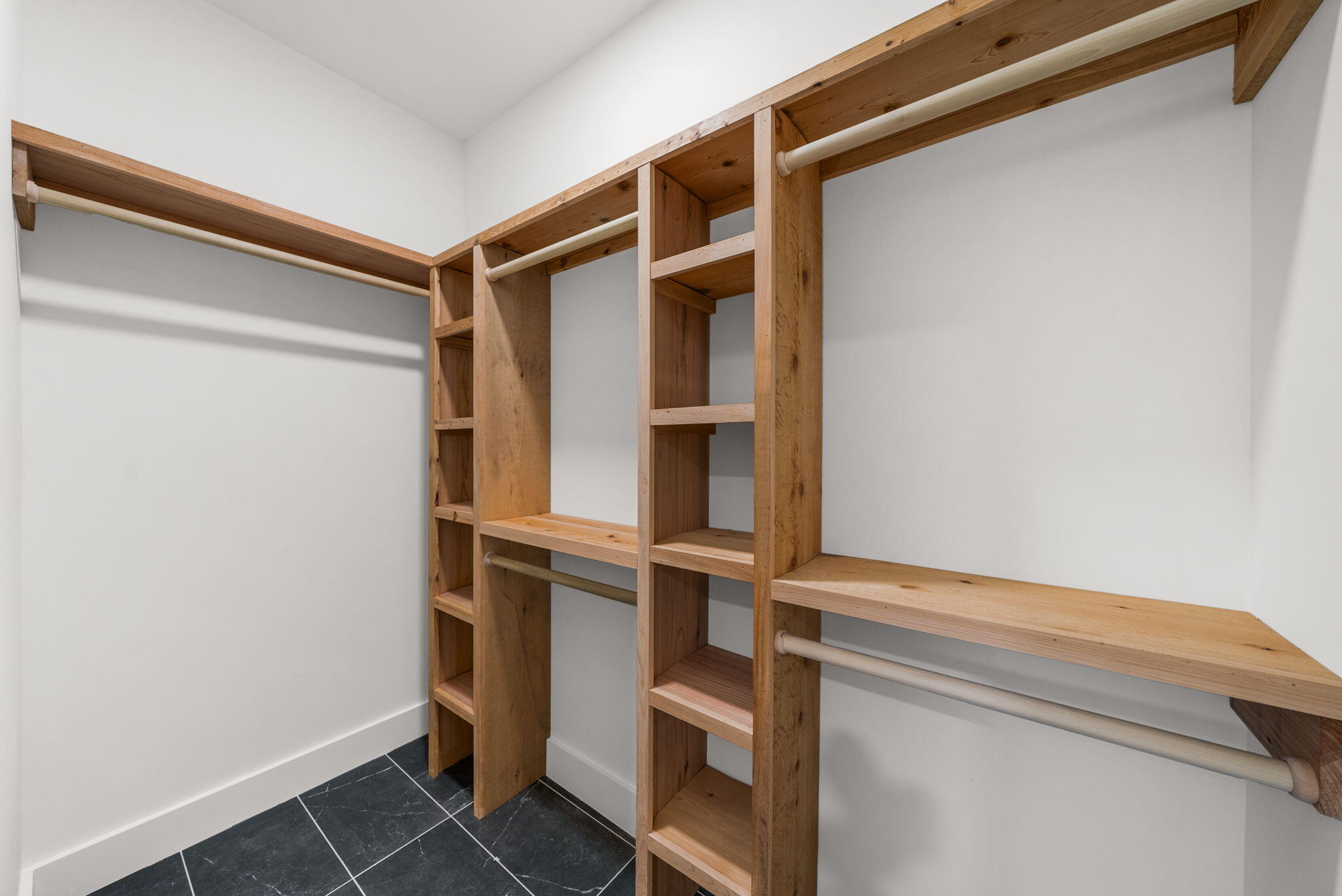1831 McKenzie Road Southport, FL 32409 - Photo 19 of 48 a view of walk in closet with empty racks