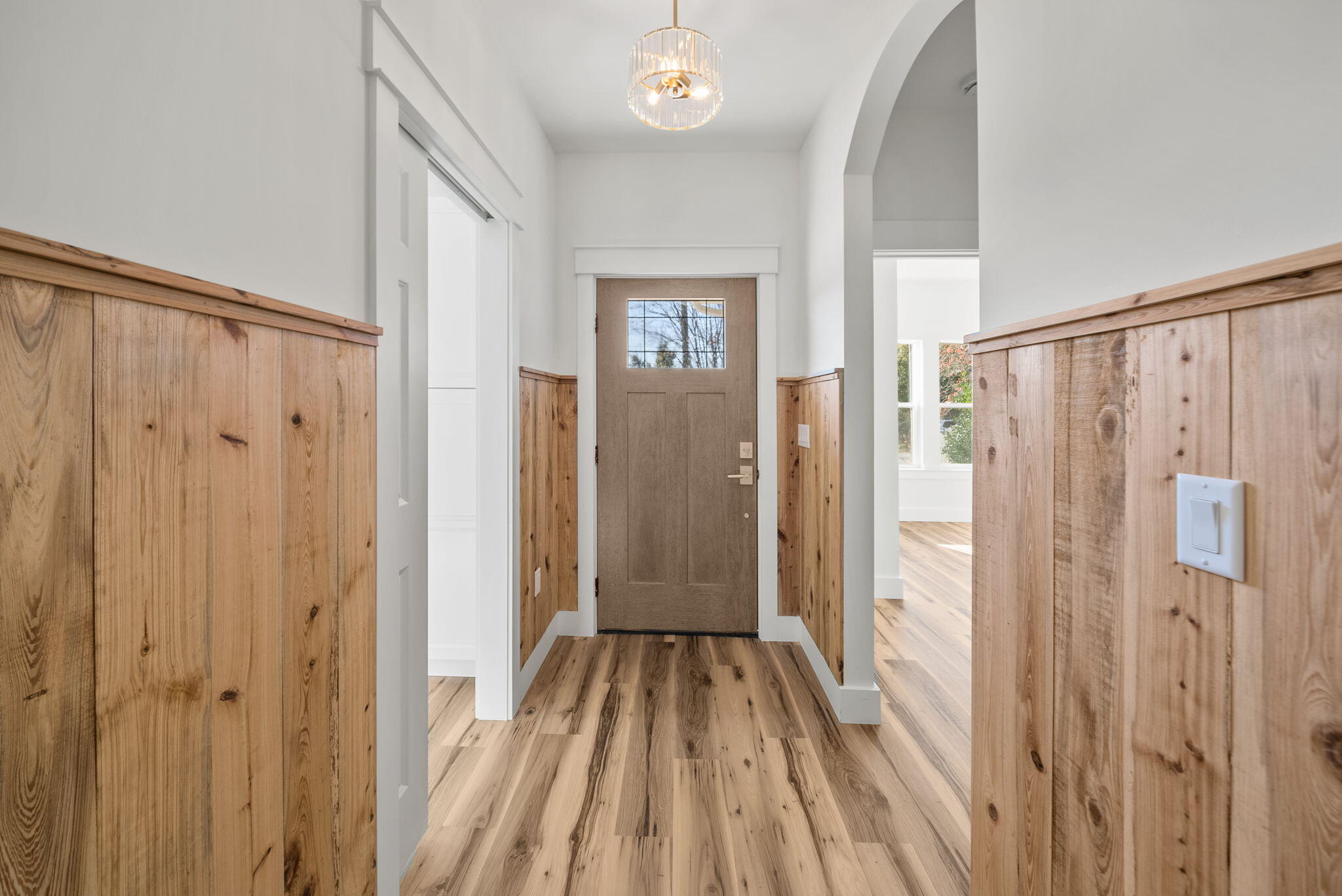 1831 McKenzie Road Southport, FL 32409 - Photo 20 of 48 a view of a hallway with wooden floor and closet area