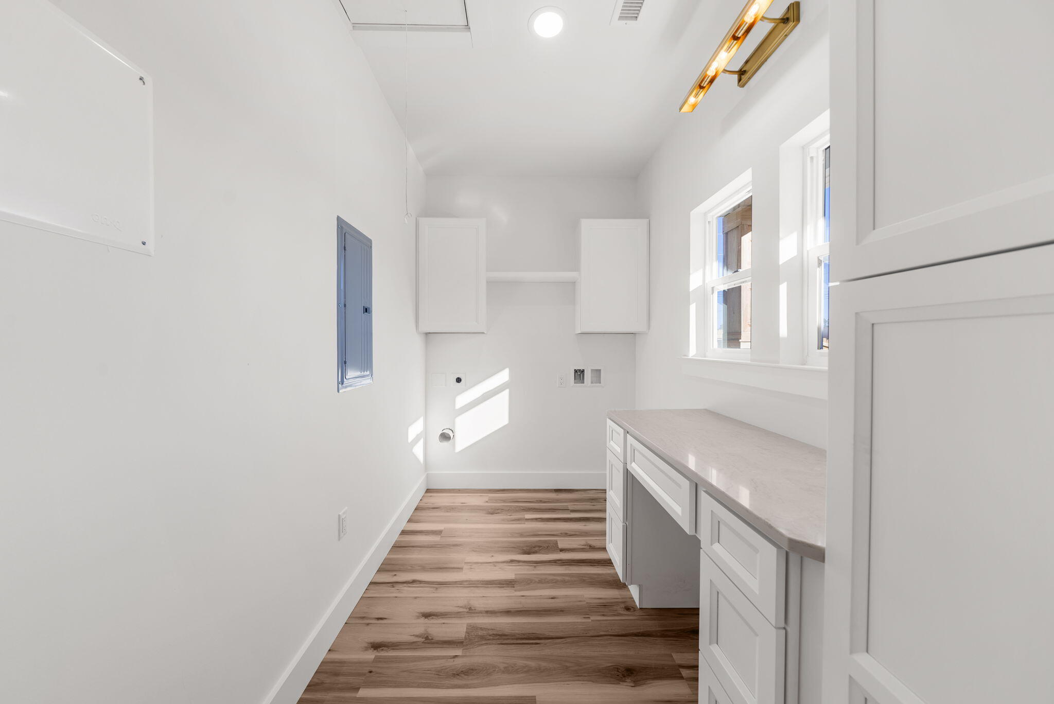 1831 McKenzie Road Southport, FL 32409 - Photo 23 of 48 a view of a kitchen with wooden floor and electronic appliances