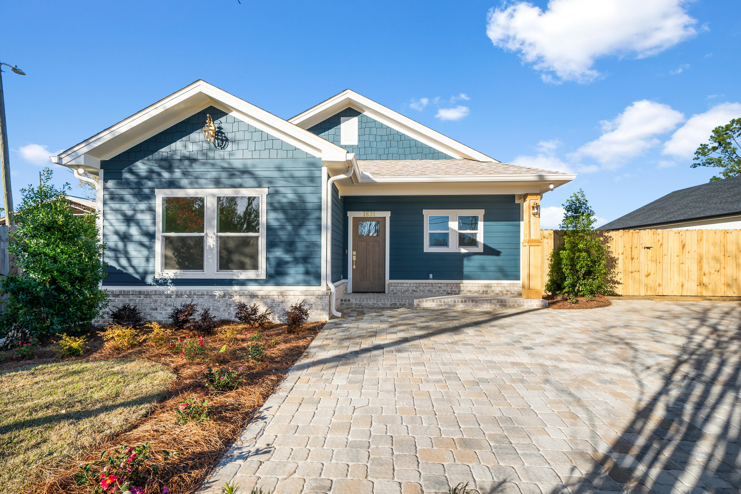 1831 McKenzie Road Southport, FL 32409 - Photo 29 of 48 a front view of a house with a yard