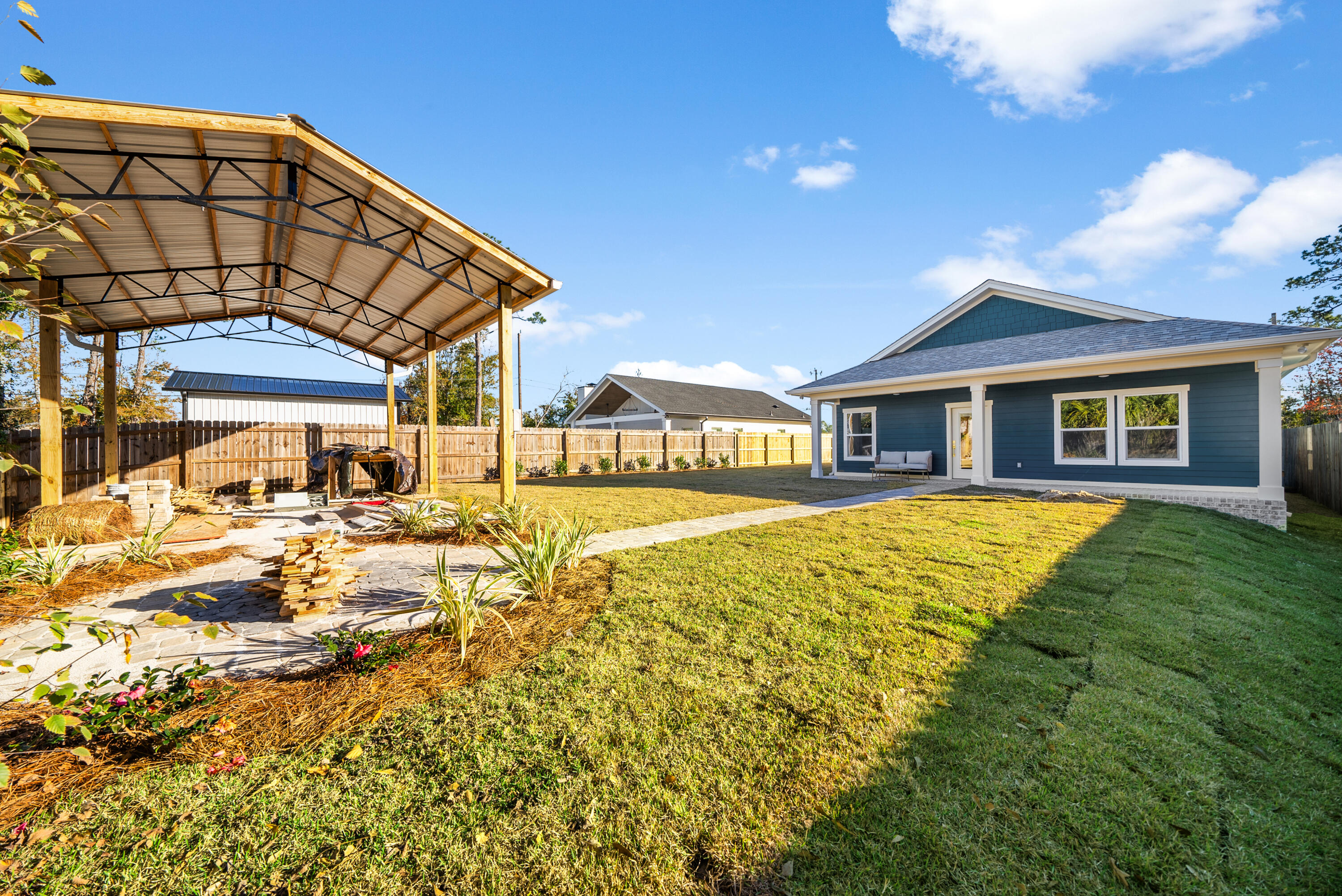 1831 McKenzie Road Southport, FL 32409 - Photo 4 of 48 a view of a house with a swimming pool