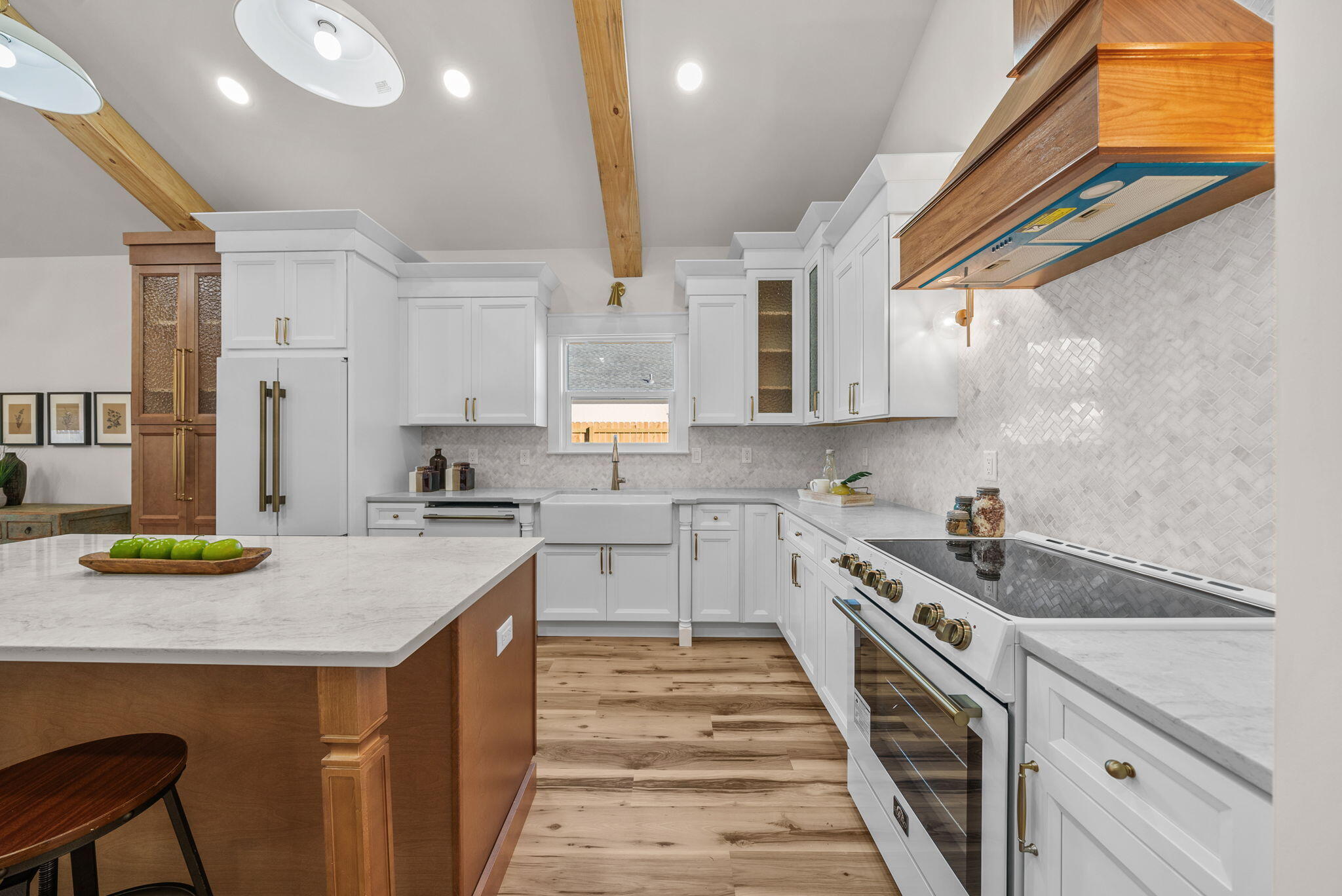 1831 McKenzie Road Southport, FL 32409 - Photo 6 of 48 a kitchen with a sink stove and cabinets