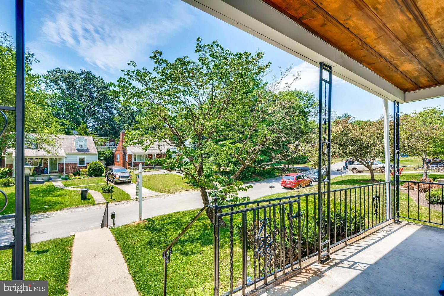 1018 St Albans Road Baltimore, MD 21239 - Photo 2 of 28 a view of a garden and trees